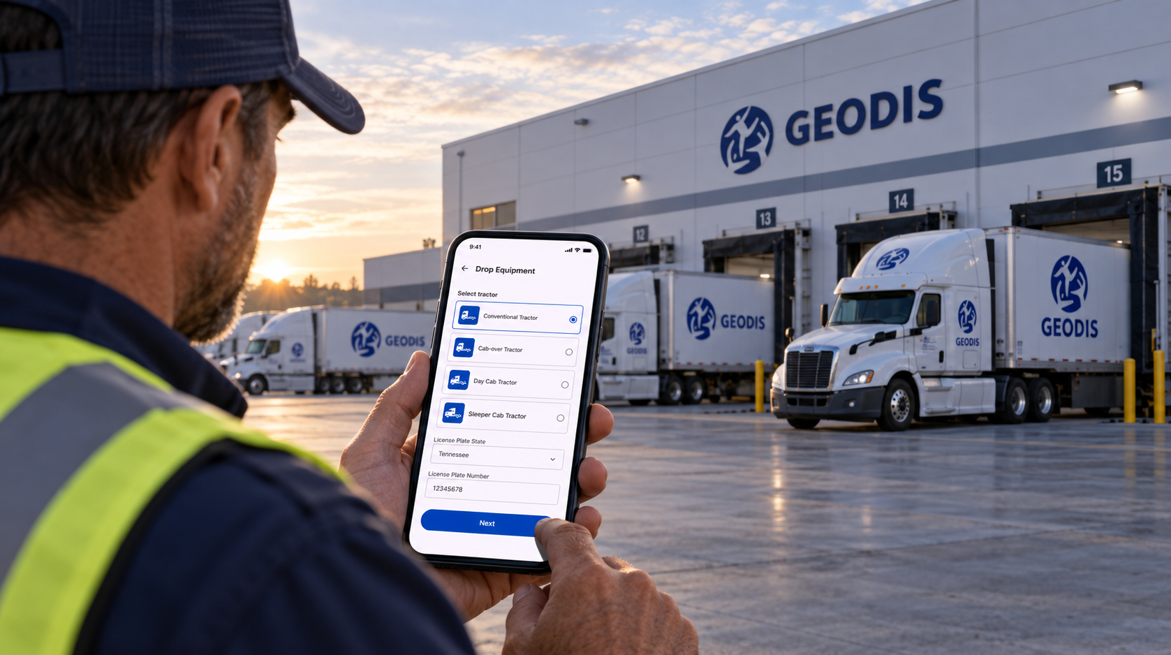GEODIS driver using the Driver Mobile equipment-selection workflow outside a logistics warehouse with trucks at loading docks.